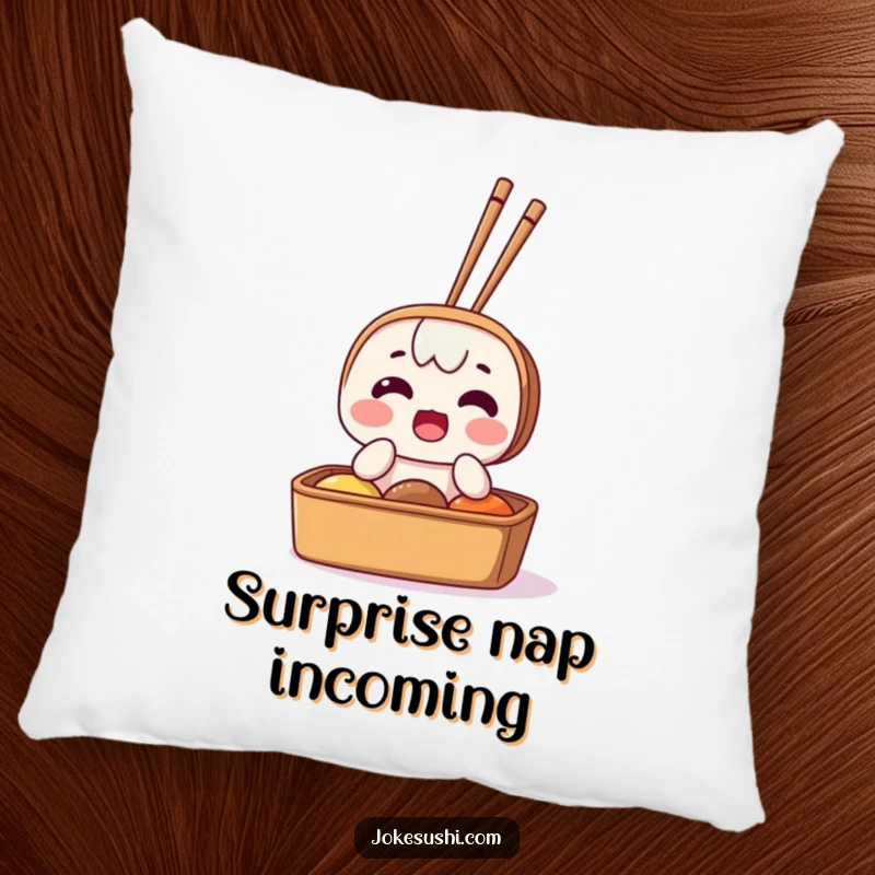 Funny pillow with a surprised bento box character and chopsticks sticking out, offering comfort and a humorous decorative accent.