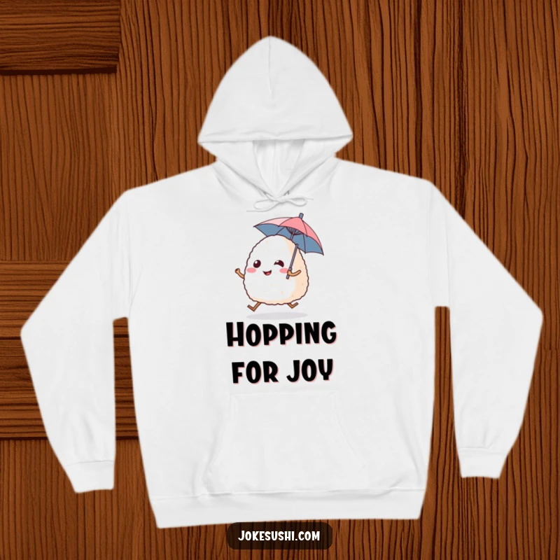 Funny hoodie featuring a smiling onigiri rice ball character with legs energetically hopping, carrying a tiny umbrella, perfect for warmth.