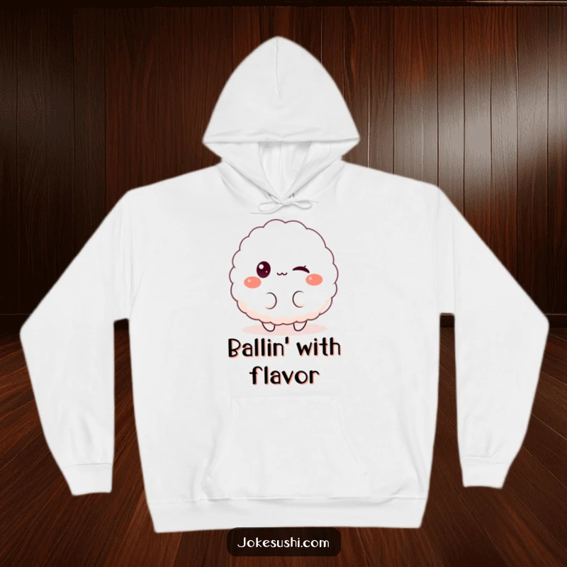 Funny hoodie with a fluffy rice ball character winking playfully at the viewer, designed for cozy comfort and a touch of cute humor.