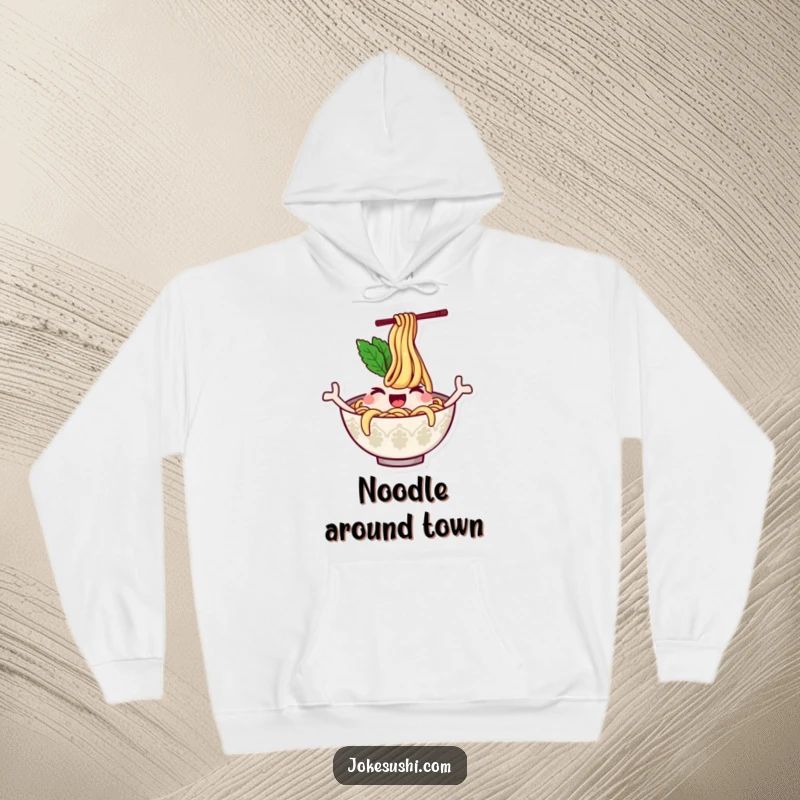 Funny hoodie depicting a winking ramen bowl character with noodles waving like arms, offering warmth and a dose of playful, comfort food-inspired humor.