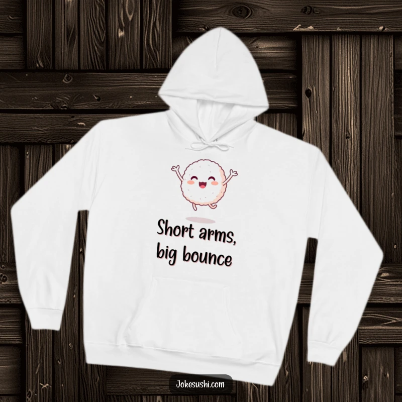 Funny Rice Ball Hoodie: A happy rice ball with short arms is depicted mid-jump, offering warm apparel filled with food-related humor.