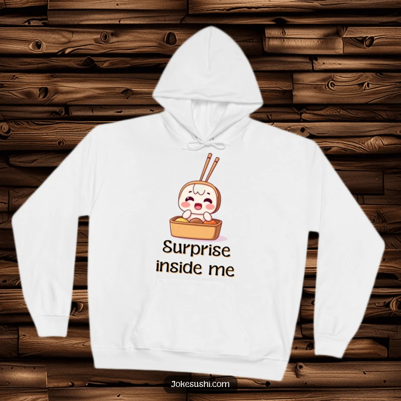 Funny hoodie illustrating a surprised bento box character with chopsticks protruding, emphasizing a humorous and unexpected mealtime moment.