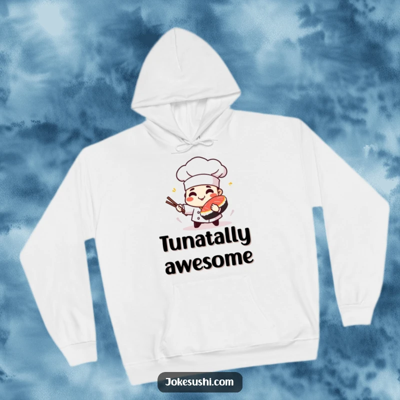 Funny hoodie featuring a playful sushi chef character spinning a piece of tuna, perfect for cozy enjoyment.