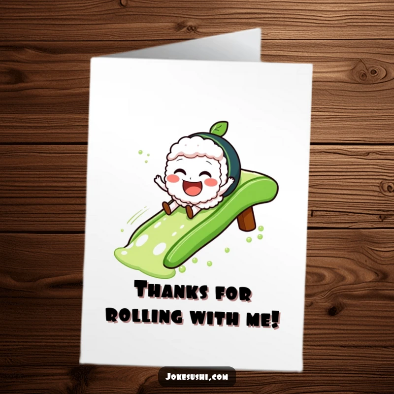 Funny Free Printable Thank You Card: A jovial sushi character slides down a green tea slide, conveying thanks with a playful slide.