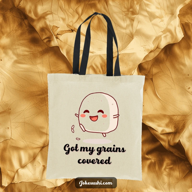 Funny tote bag with a grinning onigiri character playfully kicking a rice grain, a charming and humorous accessory.